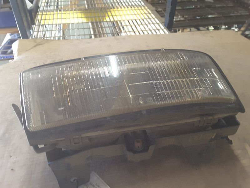 87 88 TEMPEST R. HEADLIGHT 65736