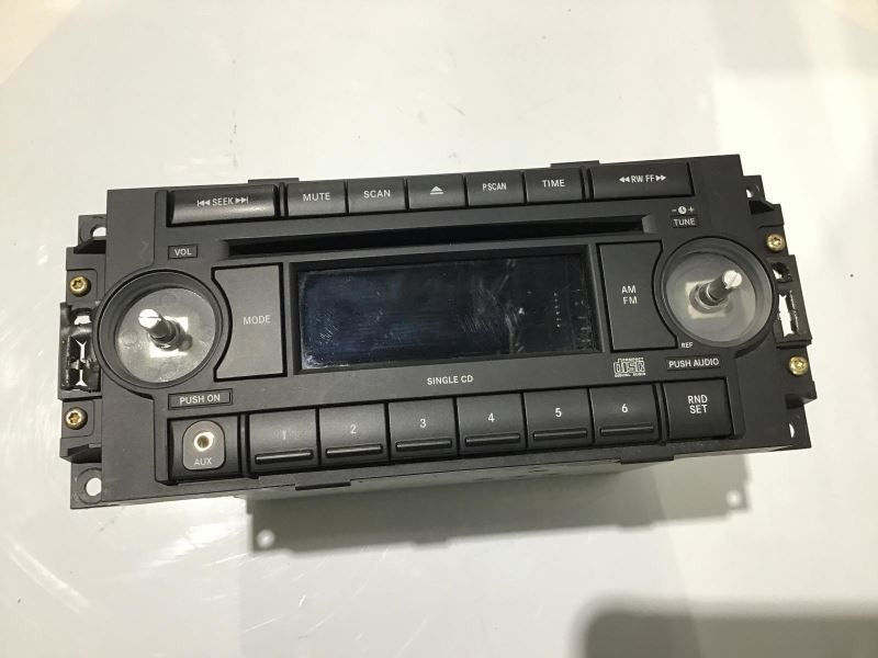 2002-2010 Dodge Chrysler Plymouth Jeep Mopar Radio REF P05064173AG w/ acc plug