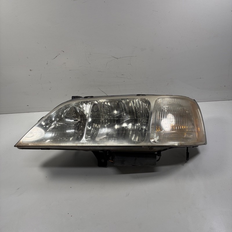 99-04 Acura RL Left Headlight OEM