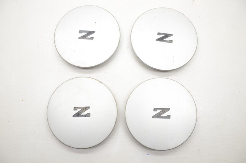 84-89 Nissan 300ZX Z31 2+0 Set of 4 Silver Z Wheel Center Caps 4031721P00