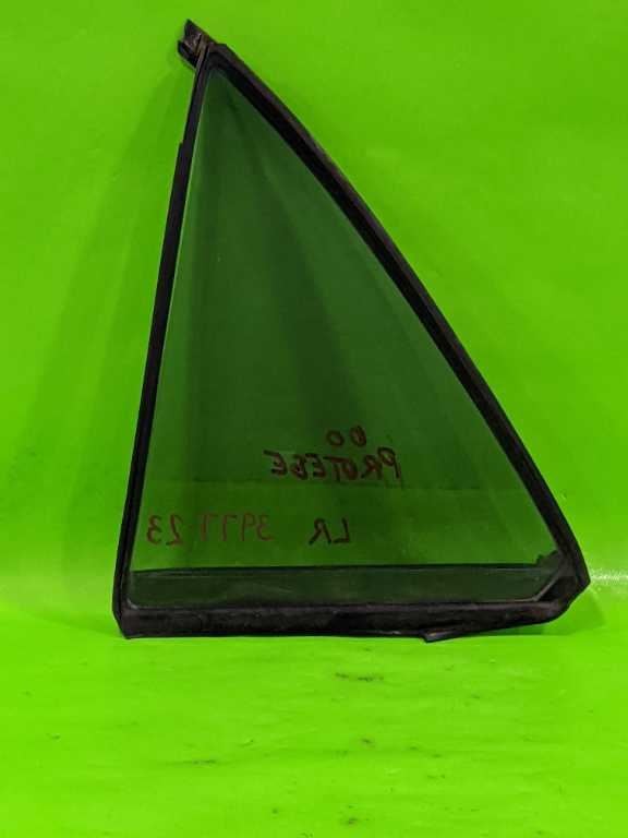 99 00 01 02 03 PROTEGE DRIVER LEFT REAR VENT GLASS OEM 3977-23