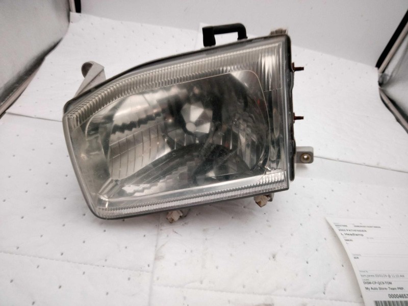 2002 Nissan Pathfinder Left Headlight Assembly Silver OEM Used 122874