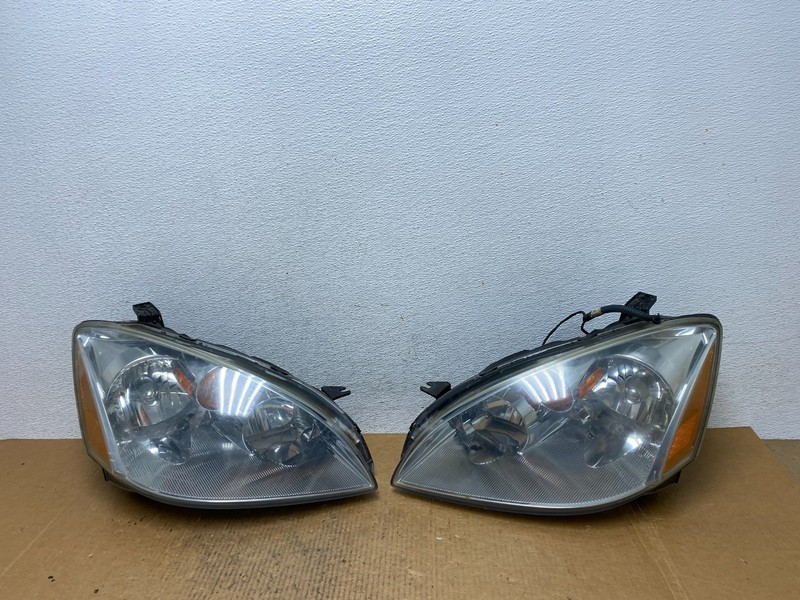 2002 to 2004 Nissan Altima Left+Right Side Set Halogen Headlights OEM AE1146 DW