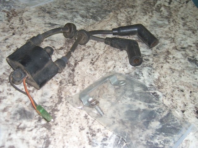 1994 Yamaha 9.9hp 4 stroke coil boat motor part only bin 5049