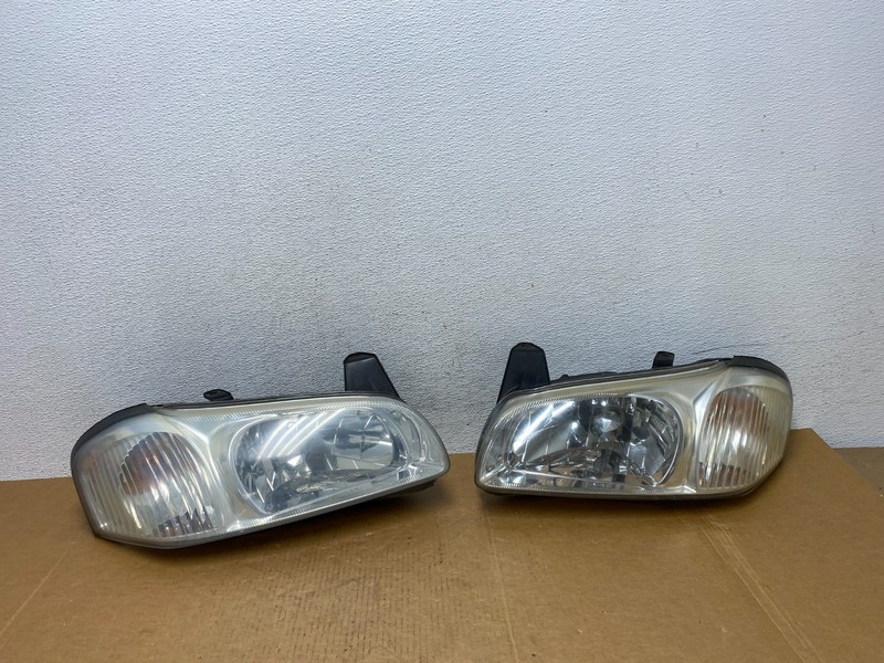 2000 to 2001 Nissan Maxima Left+Right Side Set Halogen Headlights OEM AD9164 DW