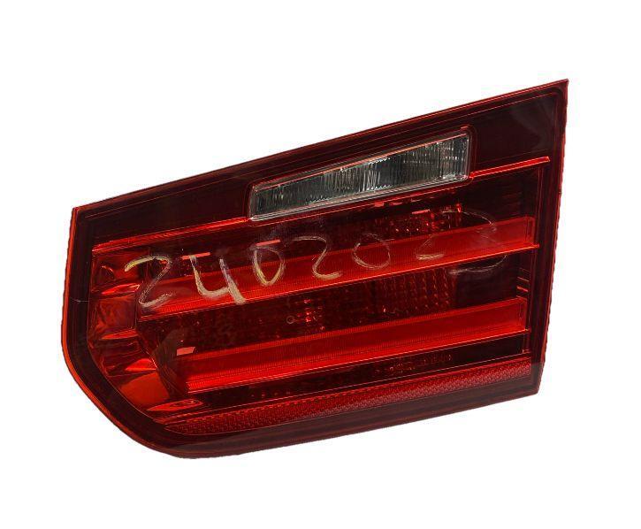 BMW 320 tail light 2012 to 2015 right side decklid mounted assy OEM 63217372794
