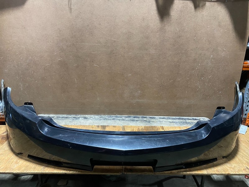 2009 to 2012 Lincoln MKS Rear Bumper Cover OEM Y9239 PS