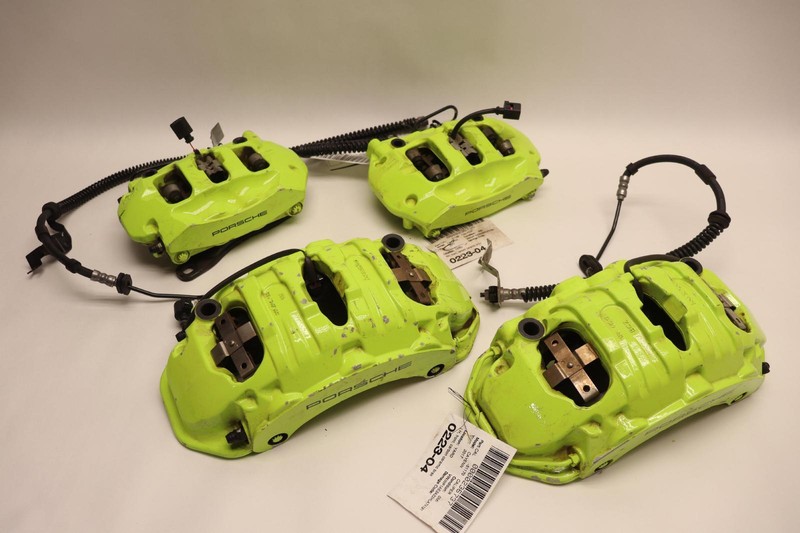 2011-2018 PORSCHE CAYENNE FRONT & REAR BRAKE CALIPER CARBON CERAMIC SET OEM