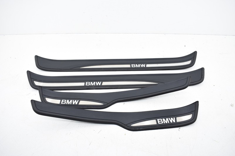 2009 BMW 328xi E90 SEDAN DOOR SILL SCUFF PLATE TRIM SET OEM BLACK KW75