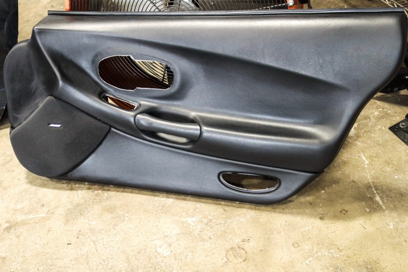 1997-2004 Chevrolet Corvette C5 Right RH Door Panel Black OEM 10247320 *USED*