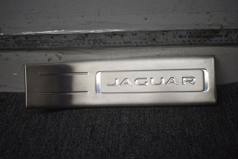 2010-2015 JAGUAR XJ REAR DOOR SCUFF PLATE FACTORY OEM