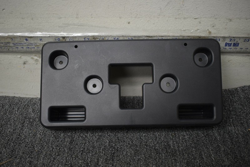CHEVROLET FRONT BUMPER LICENSE PLATE WITH LIGHT FACTORY OEM
