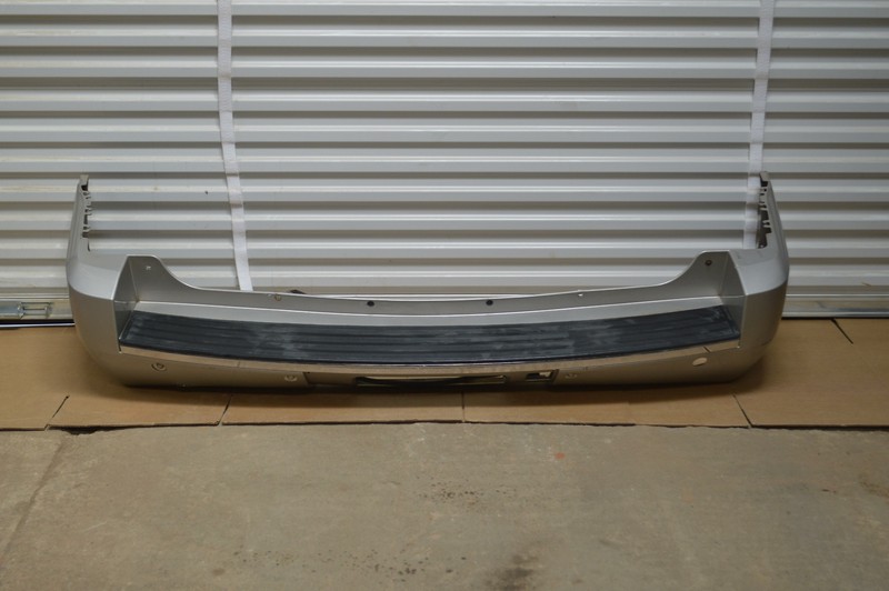 2007-2014 GMC YUKON DENALI REAR BUMPER COVER PANEL PLASTIC W/ PARK SENSOR OEM