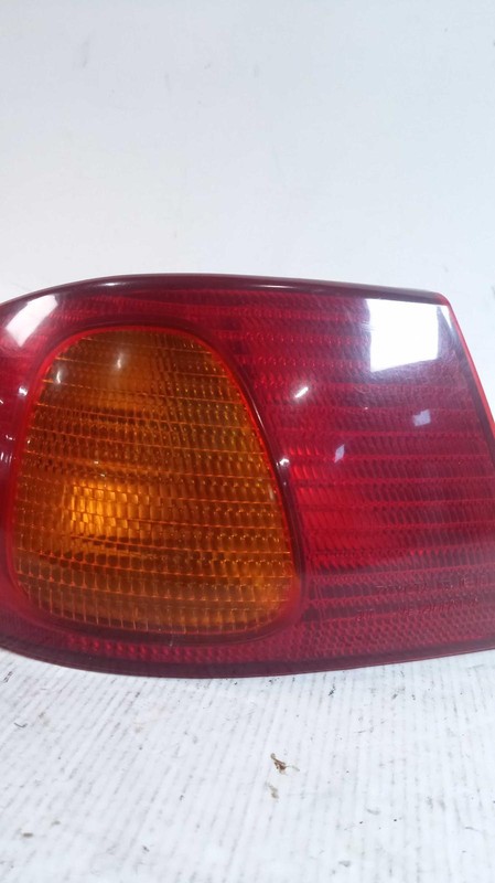 2001-2002 Toyota Corolla Left Tail Light Assembly White OEM Used 100886