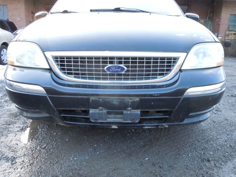1999-2003 Ford Windstar Front Bumper Cover W/ Cornering Lamps OEM UA