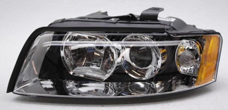 OEM Audi A4 Left Driver Side HID Headlamp 8E0-941-029-AM - Top Inner Tab Gone