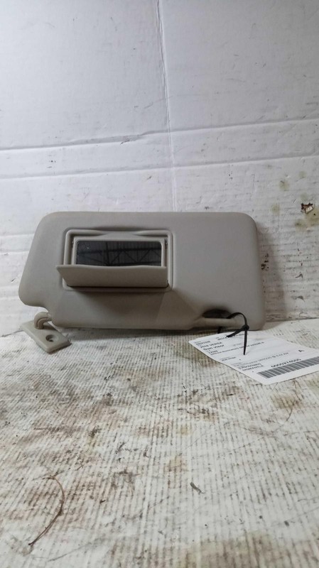 Used Right Sun Visor fits: 2016 Nissan Versa without illumination without sunroo