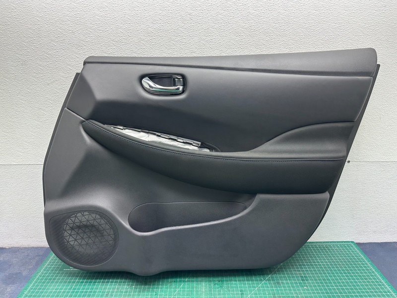 22-25 NISSAN LEAF - FRONT RIGHT PASSENGER SIDE INTERIOR DOOR PANEL TRIM OEM