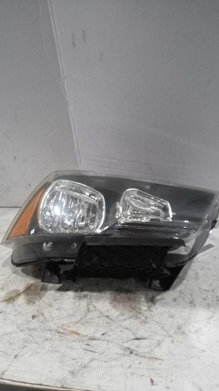 Used Right Headlight Assembly fits: 2012 Dodge Charger police package halogen R.