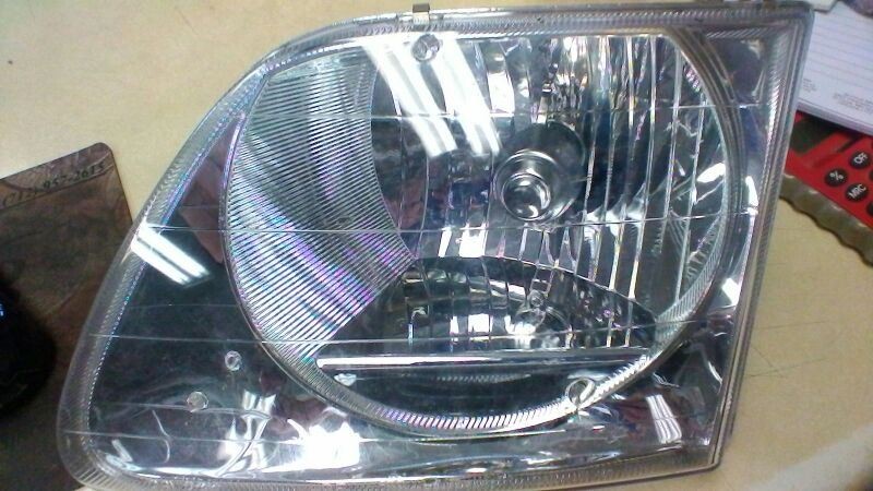 Driver Headlight Heritage Fits 97-04 FORD F150 PICKUP 101574
