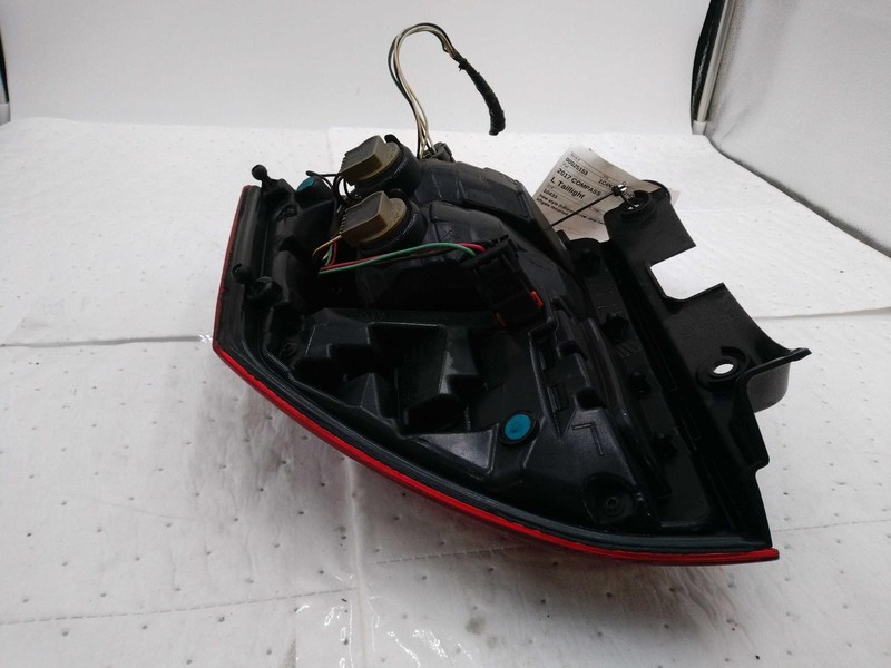 2017 Jeep Compass Left Tail Light Assembly Black 656873 Used OEM Part