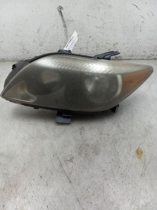05 06 07 SCION TC DRIVER LEFT HEADLIGHT BLACK BACKGROUND