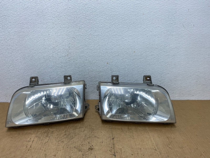 1998 to 2002 Kia Sportage Left+Right Halogen Headlights OEM AD0635 DW