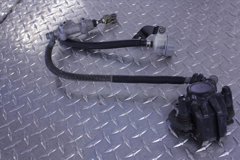 96 KAWASAKI EX 500 NINJA REAR BRAKE W/RESERVOIR MASTER CYLINDER CALIPER EX500