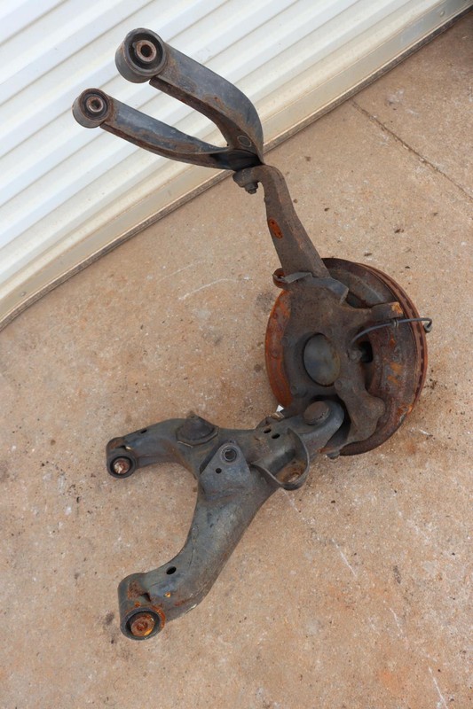 2012-2014 NISSAN NV2500 FRONT DRIVER SPINDLE KNUCKLE HUB W/ CONTROL ARM ASSY OEM