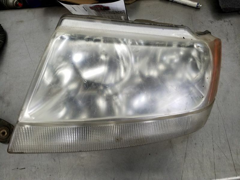 Driver Headlight Crystal Clear Fits 99-04 GRAND CHEROKEE 182416