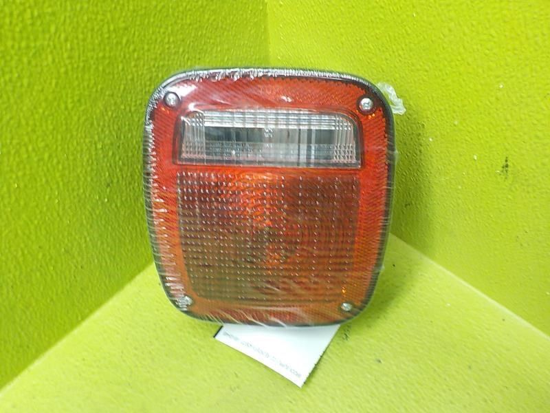 98-06 Jeep Wrangler Left Driver Tail Lamp OEM 56018649AD