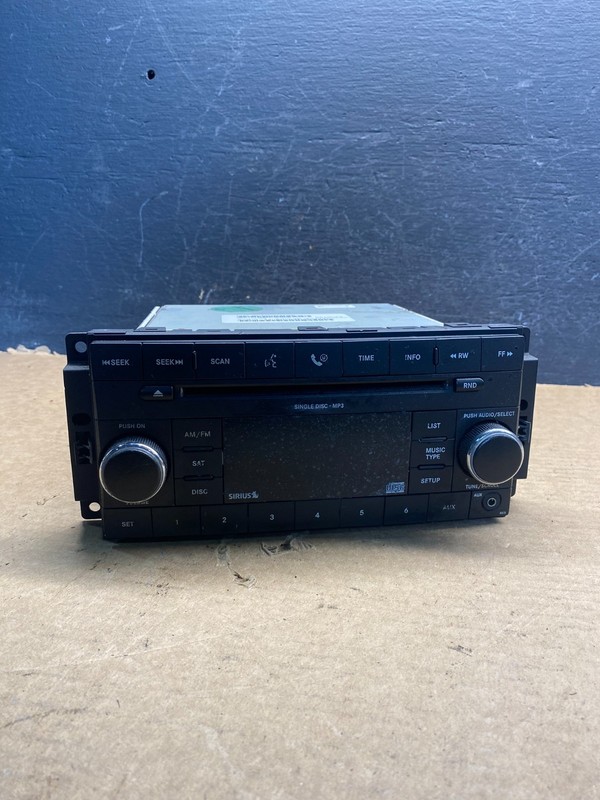 2007-2012 Chrysler Dodge Jeep Ram Radio CD MP3 AUX Receiver AD9877 DG