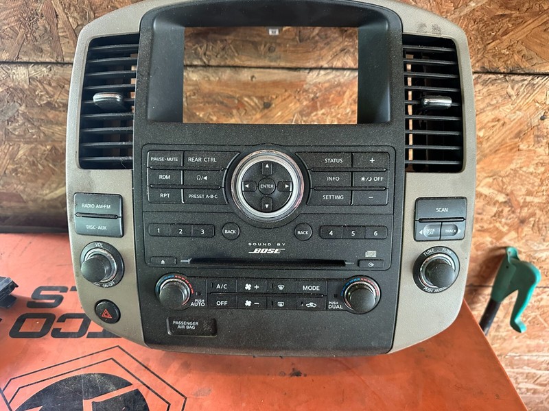 08-12 NISSAN PATHFINDER & ARMADA OEM BOSE RADIO & HEATER A/C CONTROL W/ BEZEL