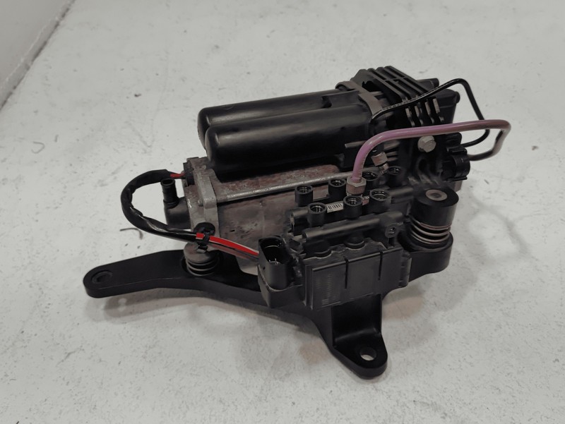 2016-2020 TESLA MODEL S AIR COMPRESSOR PUMP SUSPENSION W/ BRACKET OEM