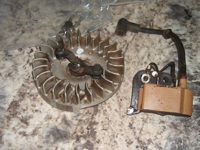 McCulloch 10-10scoil and flywheel chainsaw part600111bBin 745