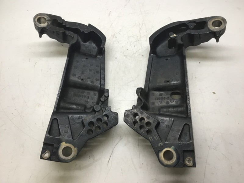 J2 Evinrude 115 hp port and starboard transom brackets 335489-2and 335416-2