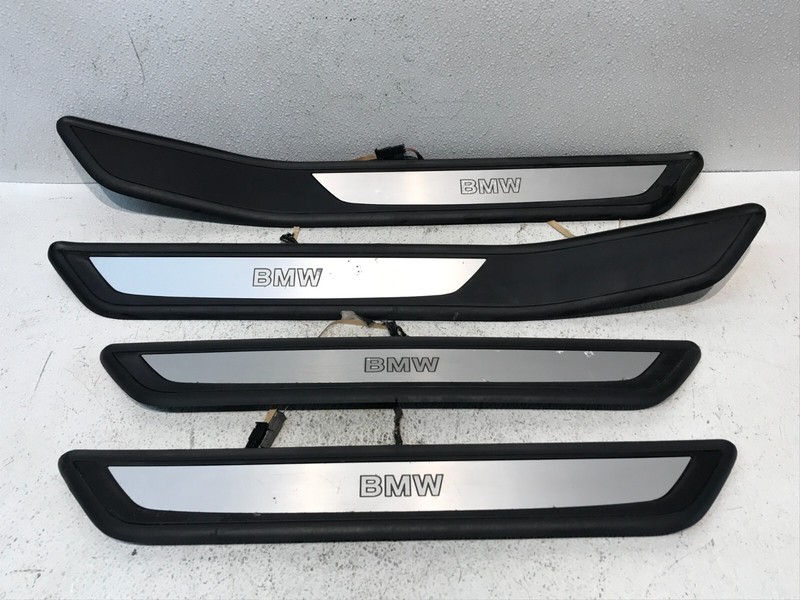 09-13 BMW F01 750i DOOR SILL TRIM SCUFF PLATE ILUMINATED OEM SET