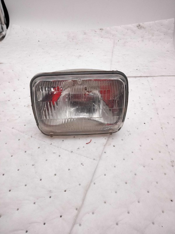 Used Headlight Assembly fits: 2007 Chevrolet Express 1500 van sealed beam Grade