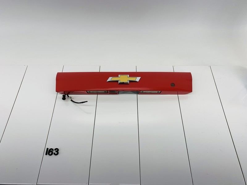 16-22 CHEVROLET SPARK REAR LIFTGATE LICENSE PLATE COVER PULL ME OVER RED OEM