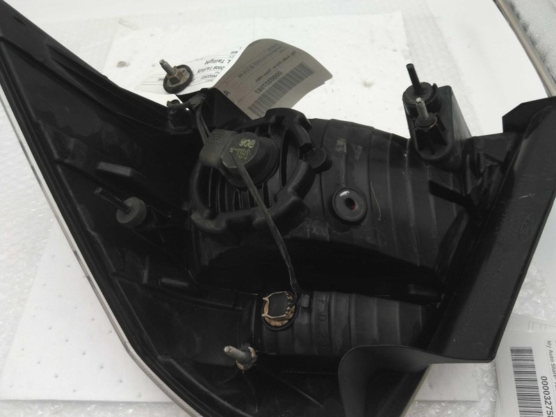 2008-2009 Ford Taurus Left Tail Light Assembly Silver OEM Used, Scratches