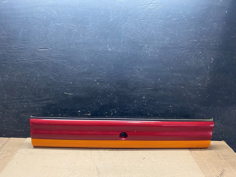 1993 to 1995 Chrysler LeBaron Center Tail Light Panel Trim OEM u7515 DG