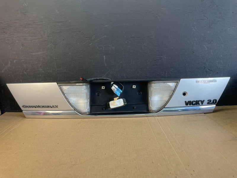 1998 - 2011 Ford Crown Victoria Trunk Rear Garnish License Plate Panel AD0202 DG