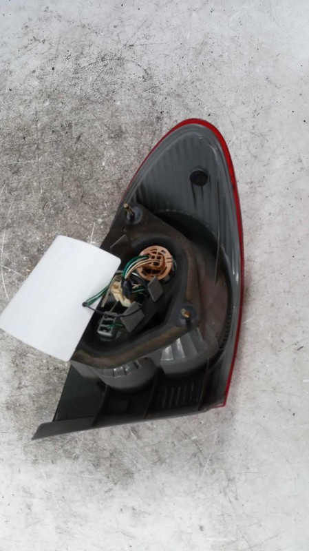 Used Left Tail Light Assembly fits: 2004 Toyota Corolla quarter panel mounted Le