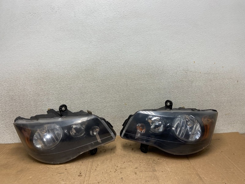 2008 to 2016 Chrysler Town and Country Left+Right Side Headlights AA7122 DW