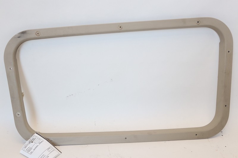 2003-2016 VOLVO VNL LEFT DRIVER BEZEL WINDOW COVER BEIGE 82712625 OEM