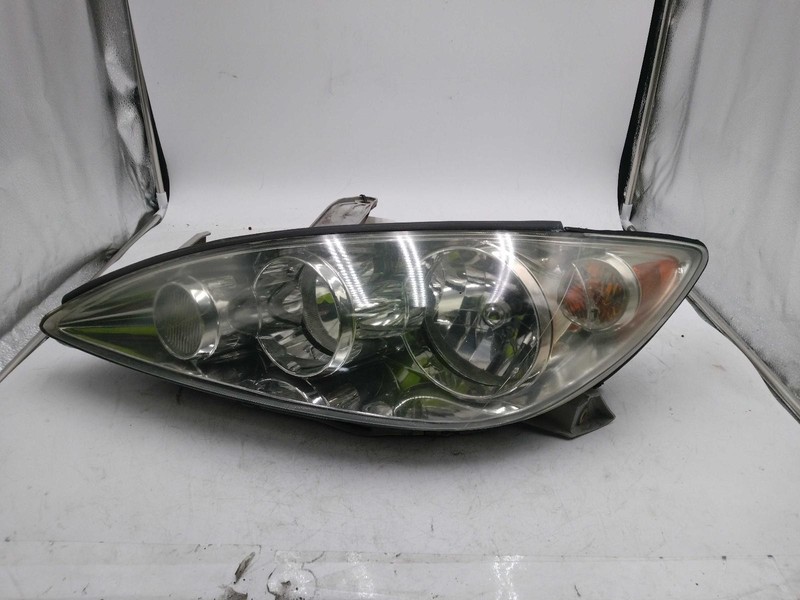 Used Left Headlight Assembly fits: 2006 Toyota Camry North America built L. SE b