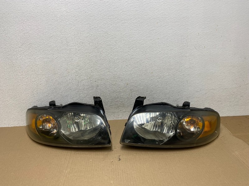 2004 - 2006 Nissan Sentra Halogen Left+Right Set Headlights AE6927 DW