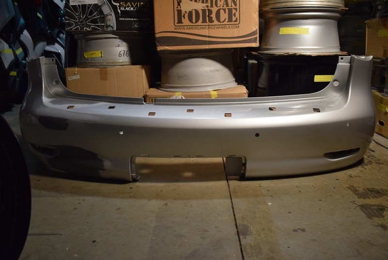 2011-2013 INFINITI QX56 REAR BUMPER COVER 850221LA0H OEM