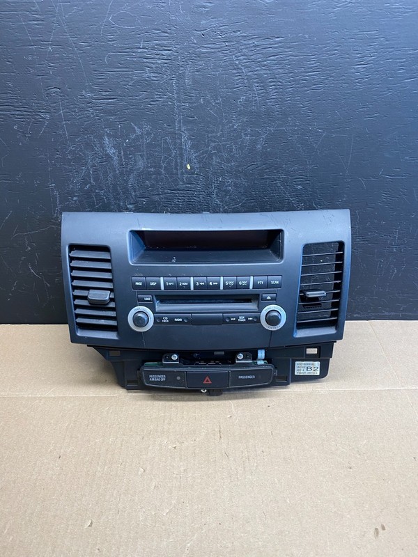 2012 Mitsubishi Lancer Radio AM/FM CD Player Air Vent AC6176 DG