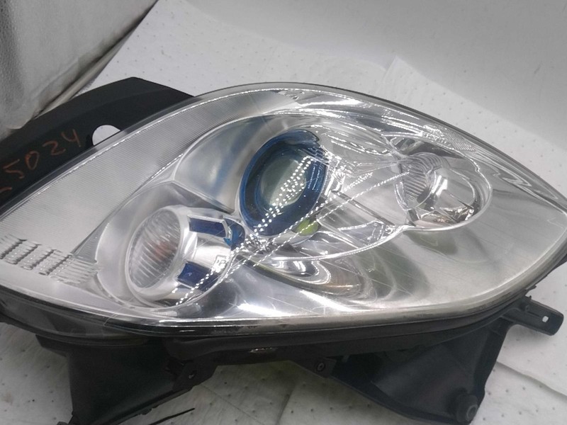 2011 Buick Enclave Right Headlight Assembly Gold Used - Broken Mount AS IS